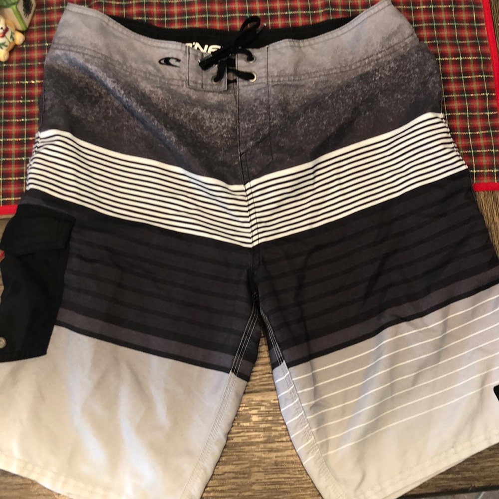O’NEILL board shorts.